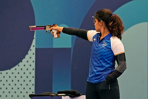 Manu Bhaker competes in the 10m air pistol final